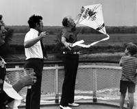 Flying kites off stern