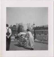 unidentified woman in front of the Tower of London