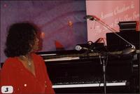 Jeannie Cheatham seated at a piano