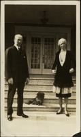 L.E. Phillips, dog, and Miss Nodie Phillips
