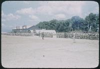 Hiller 08-159: Open dirt field with standing soldiers, Peiping