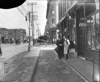 Two Men on Sidewalk