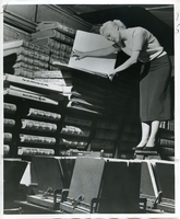 Woman and Tax Records