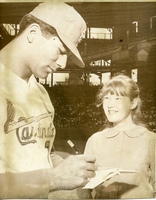 Player Signing Autograph at Baseball Clinic