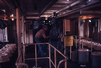 Workers in Mechanics Room on Towboat