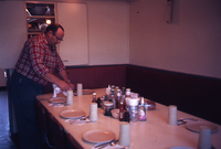 Worker Setting the Table for a Meal on Towboat