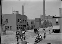 Photograph of Horse-Drawn Carriages in Downtown Saint Louis